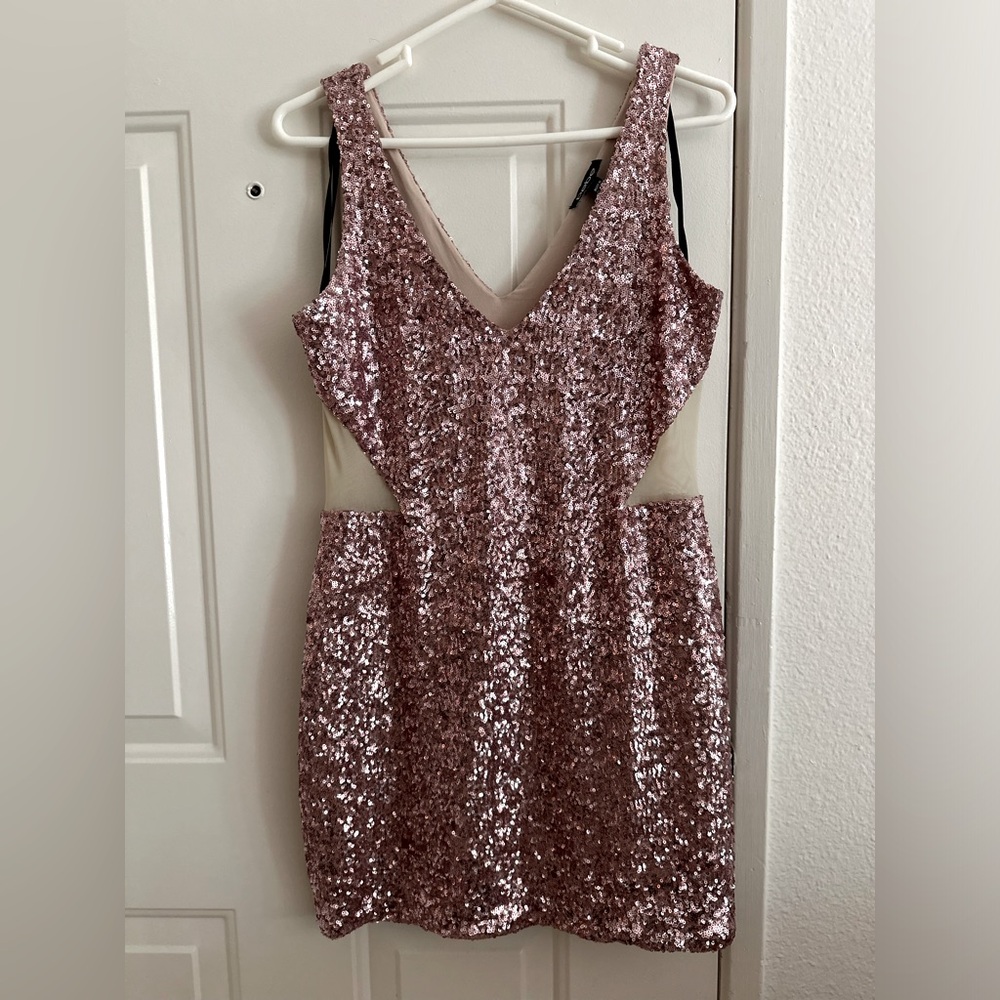 Bebe Pink Sequins Mini Dress. Pre-owned, great condition. Mesh cut out sides.